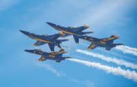 Three Blue Angels Jets flying in formation