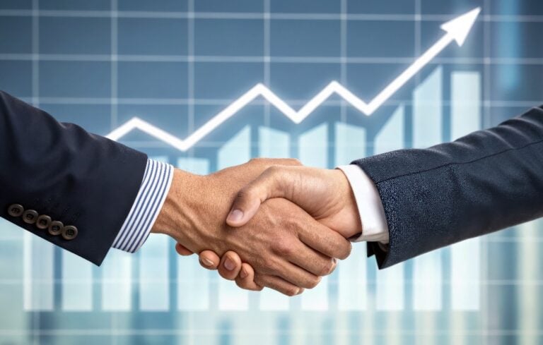 Executives shaking hands