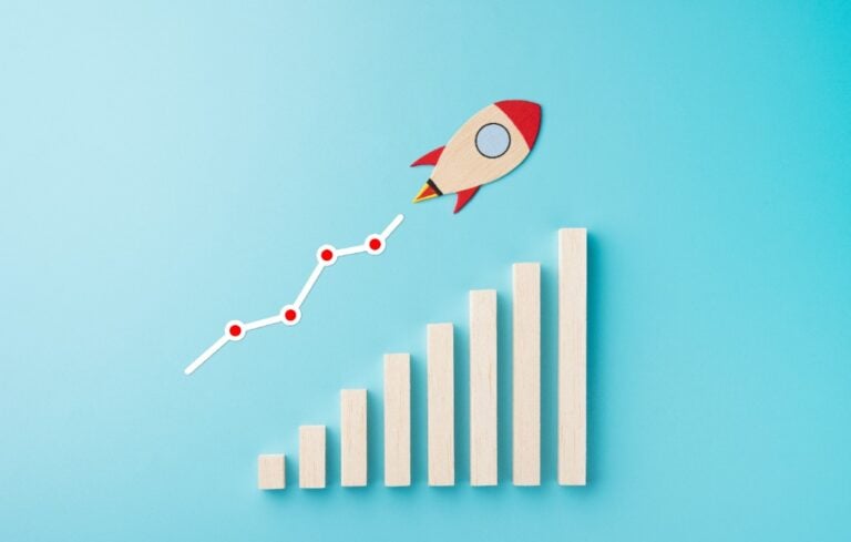 Rocket and chart on blue background business financial start up growth success concept object design