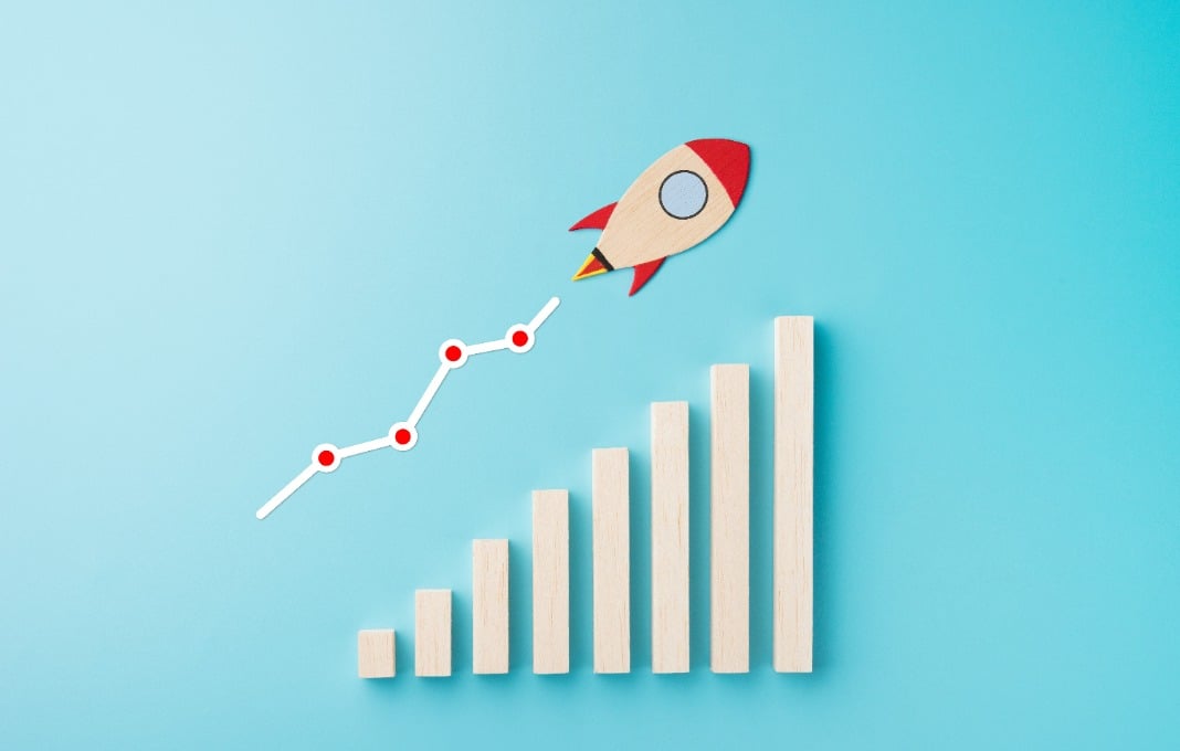 Rocket and chart on blue background business financial start up growth success concept object design