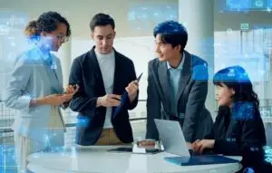 Group of people working with digital screens overlayed