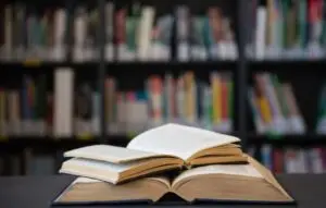 Close up of open books on table
