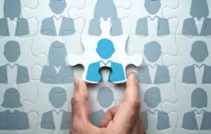 Selecting person and building team. Business people relationship concept.Connecting last jigsaw puzzle piece.