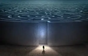 Businessman facing down maze