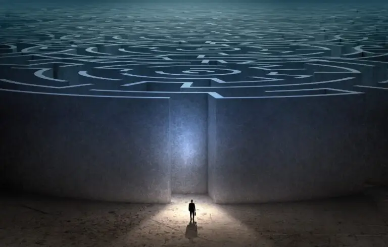 Businessman facing down maze