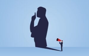 the shadow of the speaker who took the loudspeaker turned into a shush