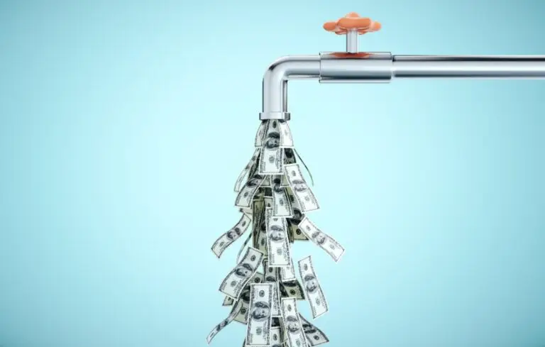 Water tap dripping dollar banknotes