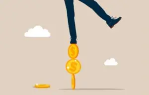Investor falling from stack of unstable money coins.