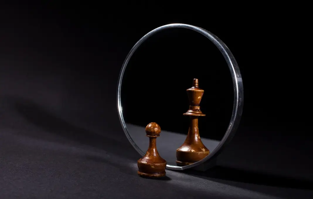 Pawn looking in the mirror and seeing a king.