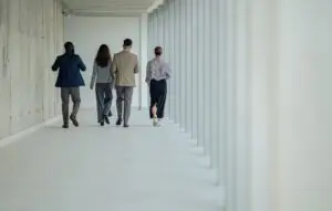 Group of business people walking away