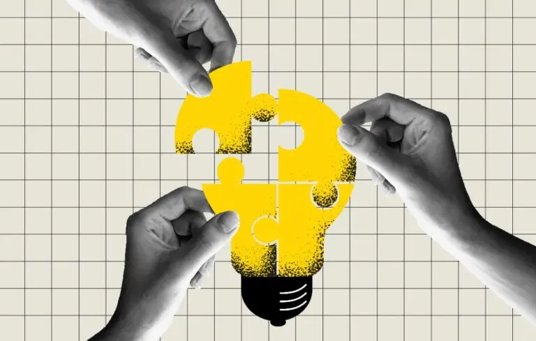 people connecting puzzle elements of a bulb