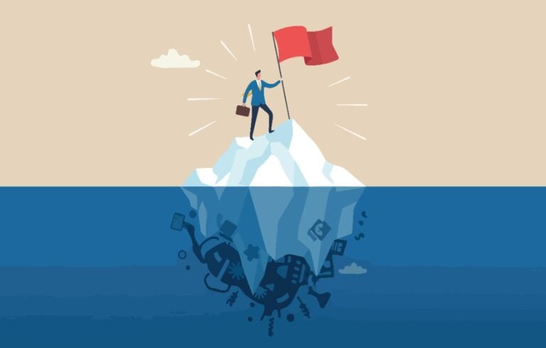 businessman holding flag at peak of iceberg above hidden danger