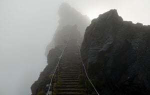 Mountain trail stairs in a fog leading to heaven, Pico do Areeiro, Madeira, Portugal