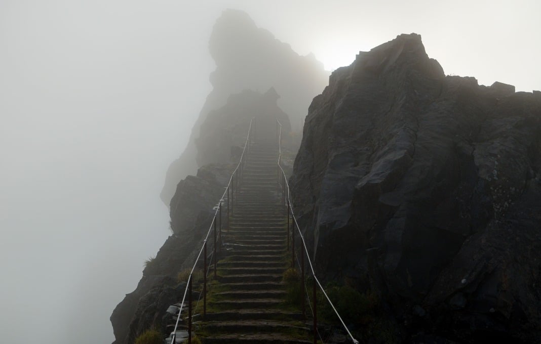 Mountain trail stairs in a fog leading to heaven, Pico do Areeiro, Madeira, Portugal