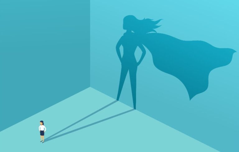 Businesswoman with shadow superhero.