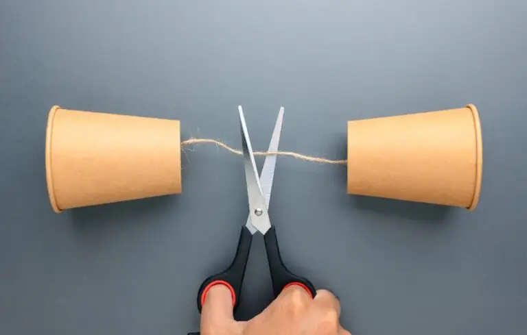 Communication breakdown and loss of connection concept with cut string phone