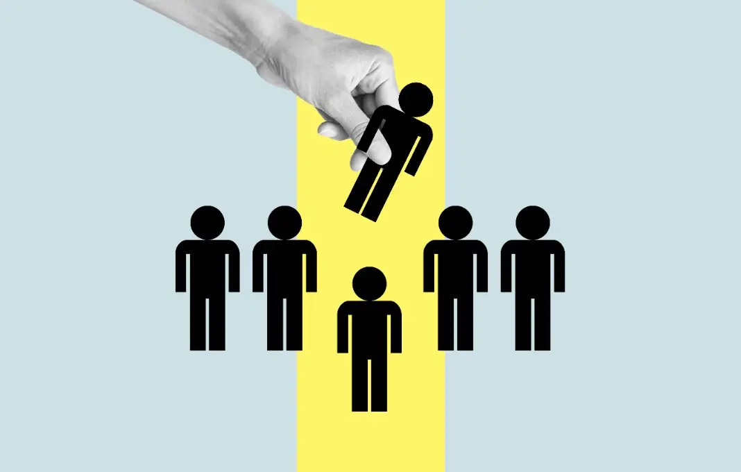 Hand picking up silhouette of man