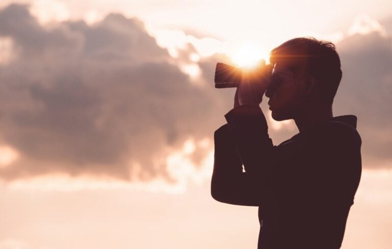 Man holding binoculars