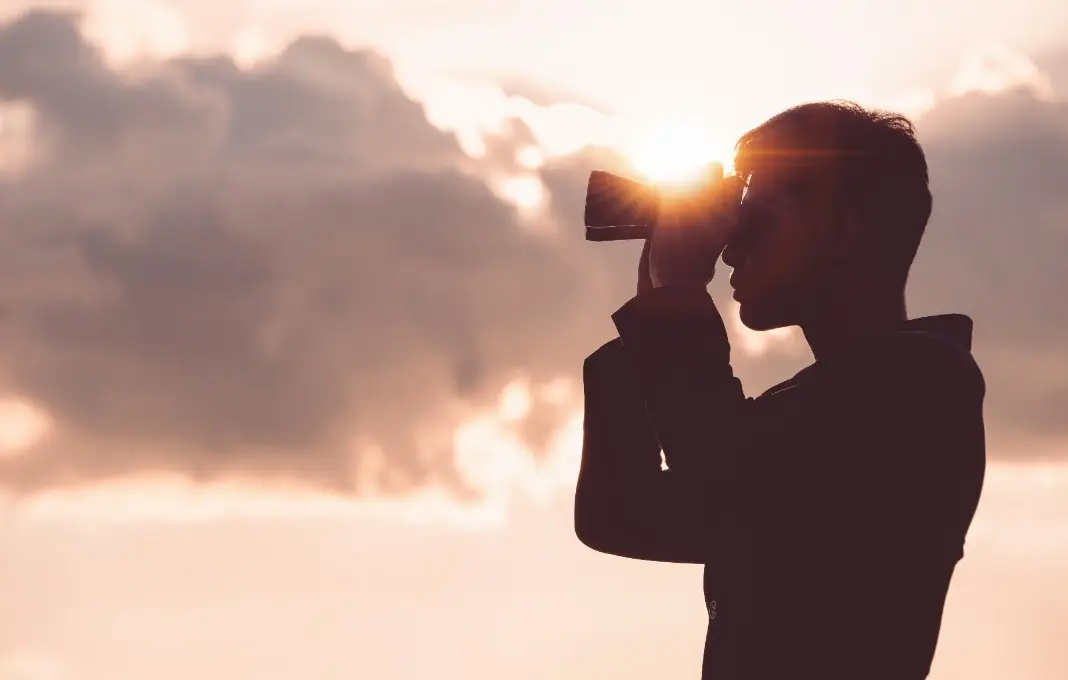 Man holding binoculars